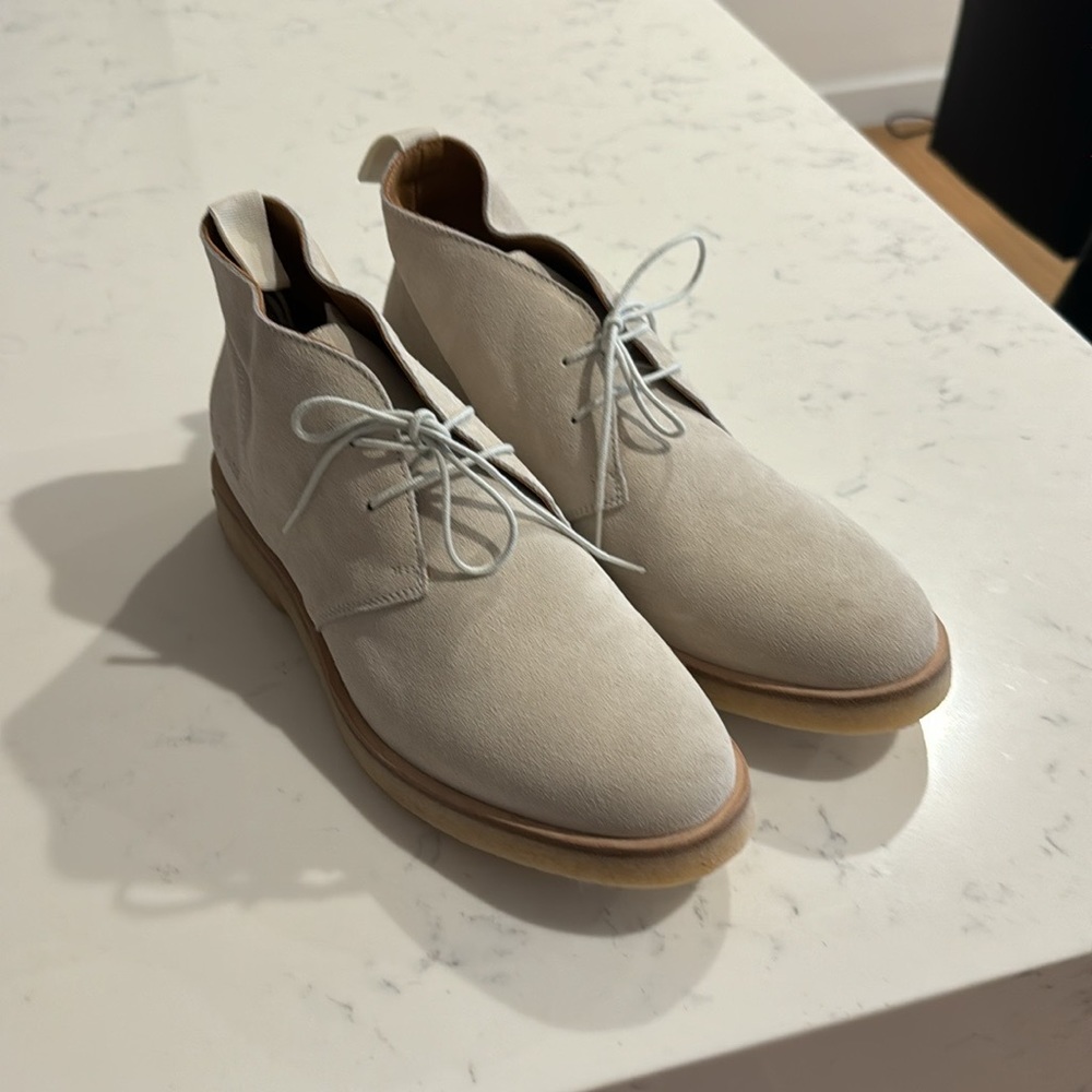 Common Projects. Never been used. Off-white Suede Chukka Boots. Men’s size 8
